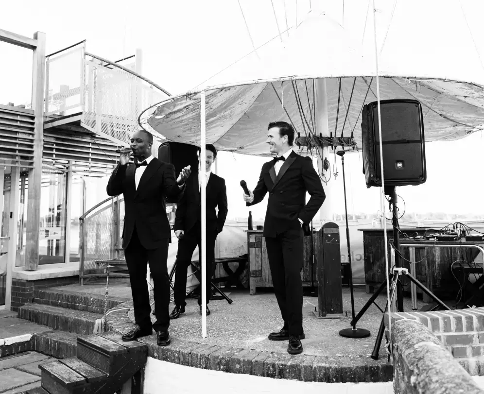 The West End Waiters performing live